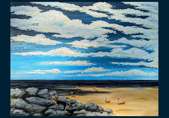 A sandy beach in the foreground with rocks off to the side; dark blue water meets the horizon line with a mix of blues in the sky with white clouds